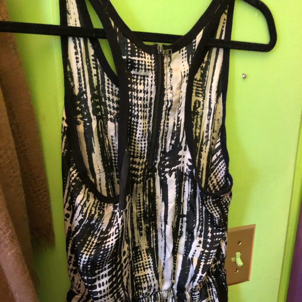 Black poppy sulky waist cinched tank